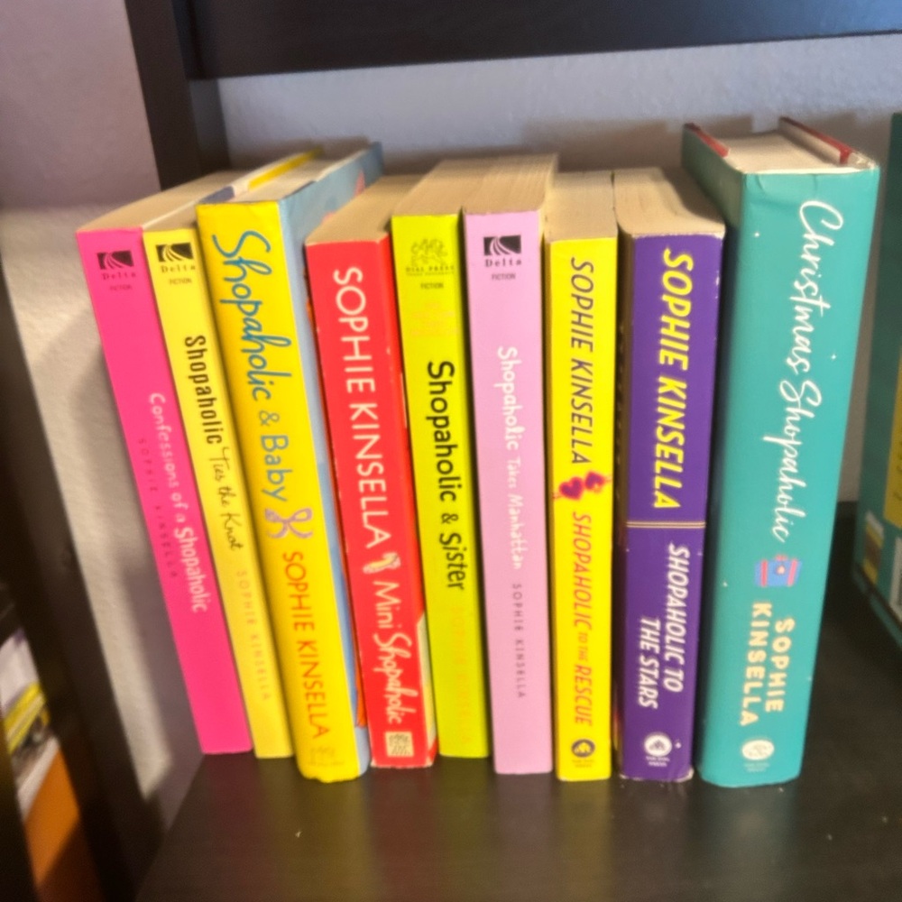 Set of 8 Shopaholic Books by Sophie Kinsella. In Good Condition.